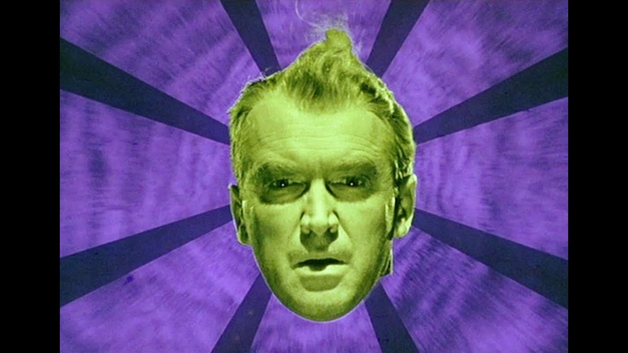 Personajul John 'Scottie' Ferguson din filmul „Vertigo”, în culorile verde și violet.